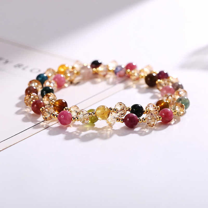 Multicolored beaded bracelet on a white surface