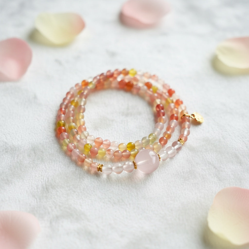 Stack of multicolored beaded bracelets on a light background
