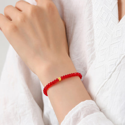 Red Austrian Crystal Fortune Bracelet with Plated Gold Cat-Eye Bead