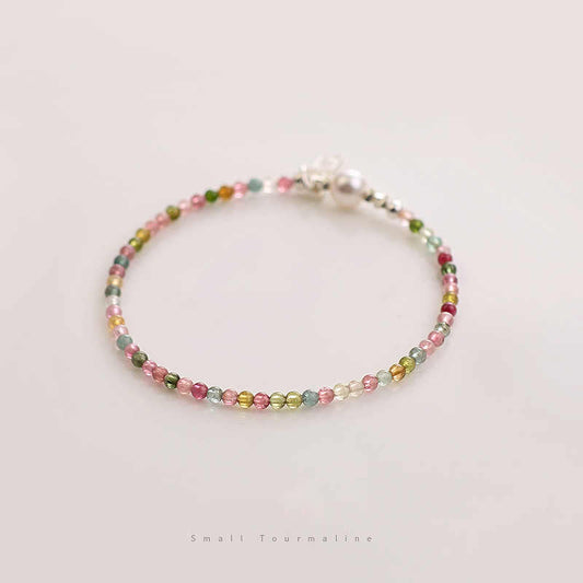 Multicolored beaded bracelet on a neutral background