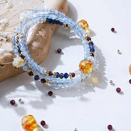 Multistrand beaded bracelet with colorful beads on a light surface
