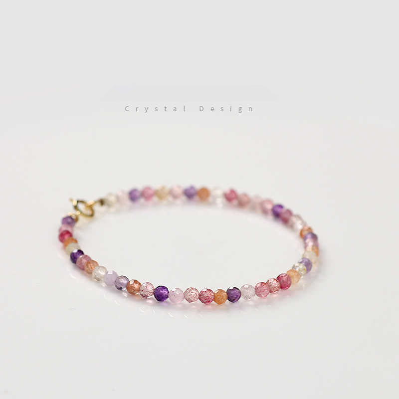 Multicolored beaded bracelet on a white background