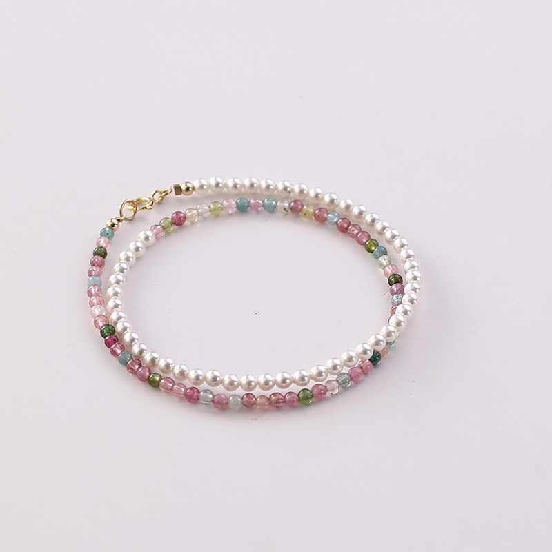 Multicolored beaded bracelet on a white background