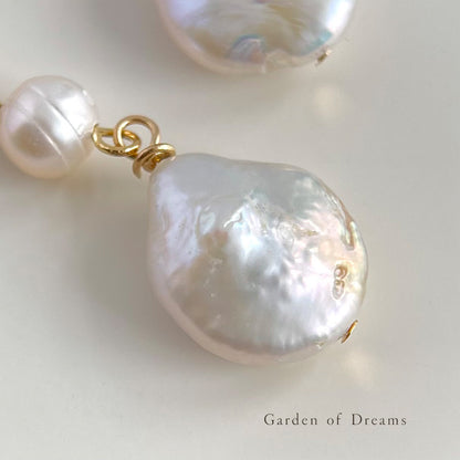 Pearl earrings with gold clasps on a light background, branded 'Garden of Dreams'.