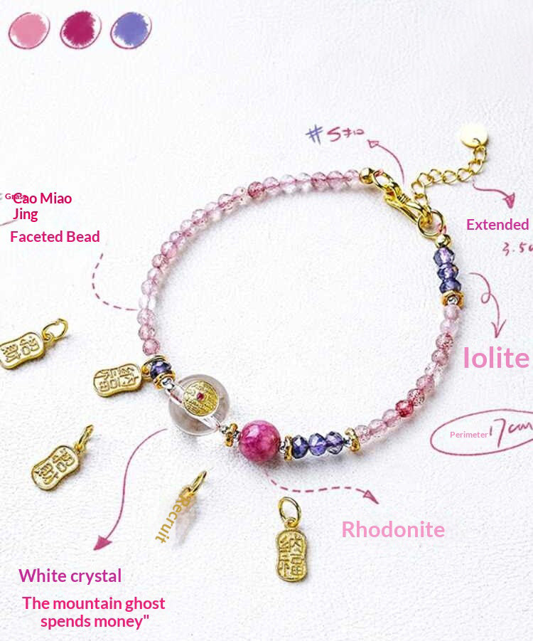 Bracelet with various beads and charms on a white background