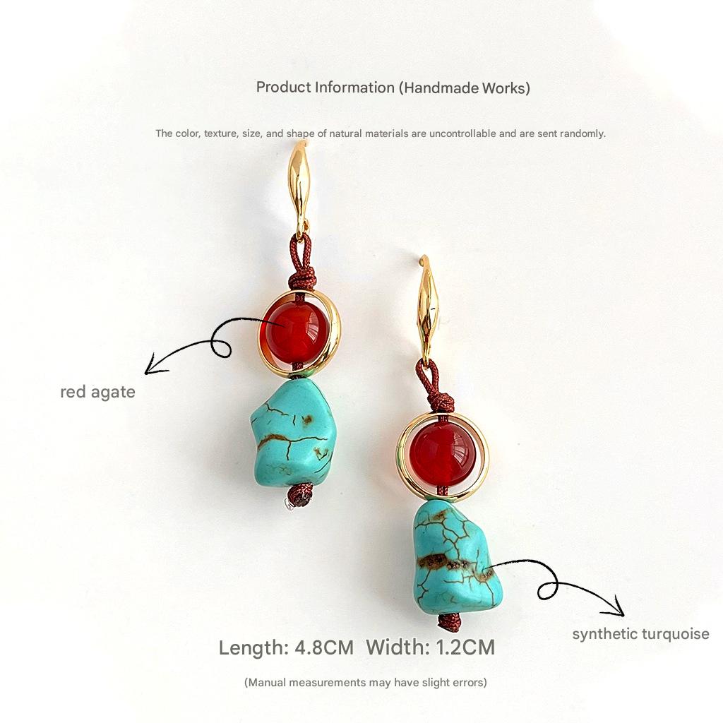 Pair of earrings with red agate and synthetic turquoise stones on a white background