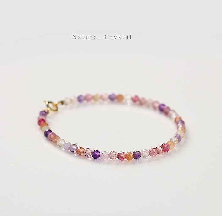 Multicolored beaded bracelet on a light background