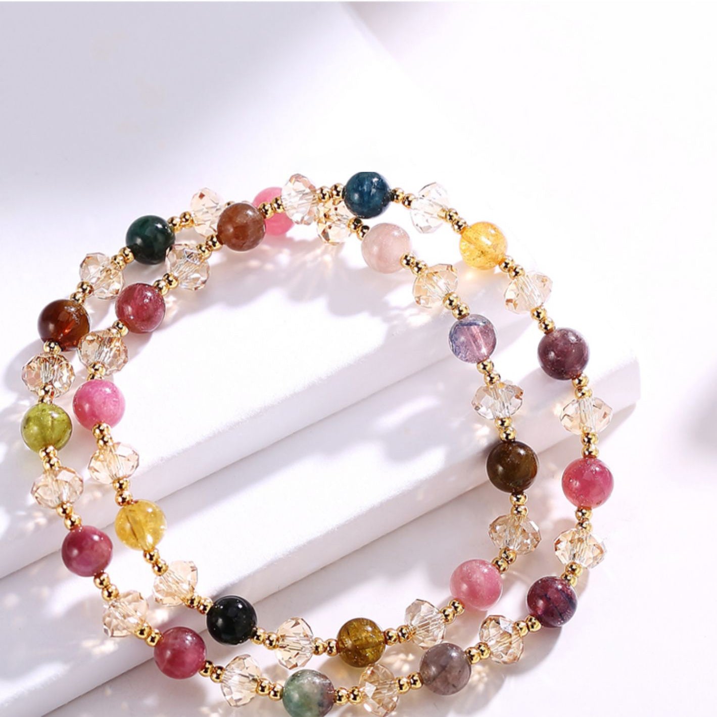 Multicolored beaded bracelet on a white surface