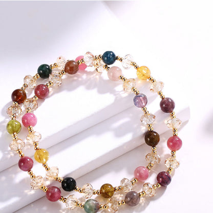 Multicolored beaded bracelet on a white surface