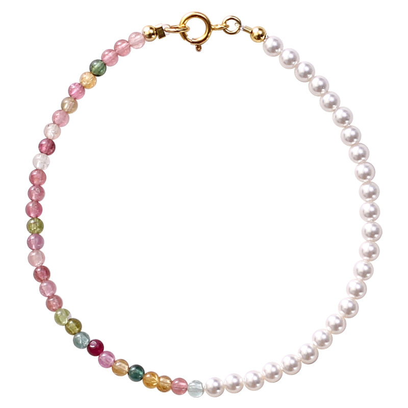 Necklace with multicolored beads and pearls on a white background