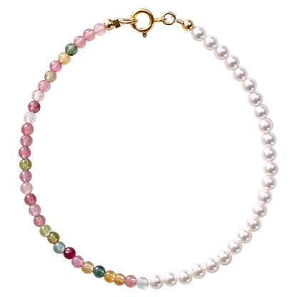 Necklace with multicolored beads and pearls on a white background