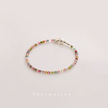 Multicolored beaded bracelet on a light background