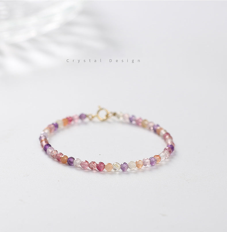 Multicolored beaded bracelet on a light background