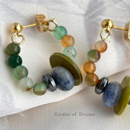 Beaded bracelet with multicolored beads on a white fabric background
