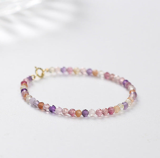Multicolored beaded bracelet on a white background