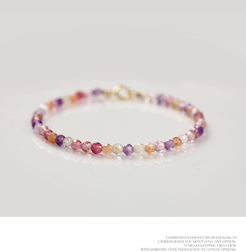 Multicolored beaded bracelet on a white background