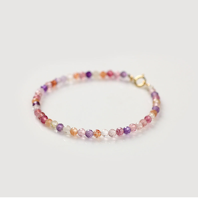 Multicolored beaded bracelet on a white background