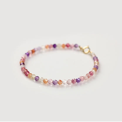 Multicolored beaded bracelet on a white background