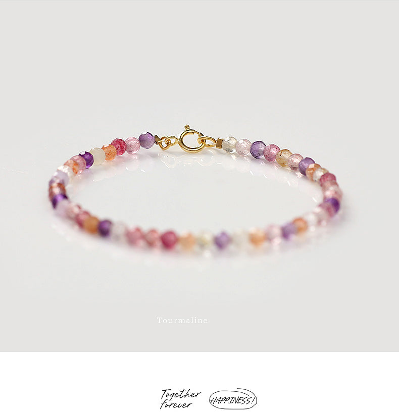 Multicolored beaded bracelet on a white background