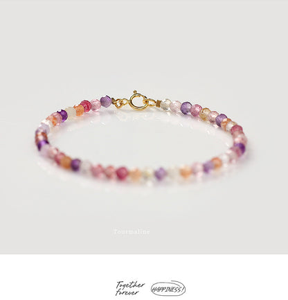 Multicolored beaded bracelet on a white background