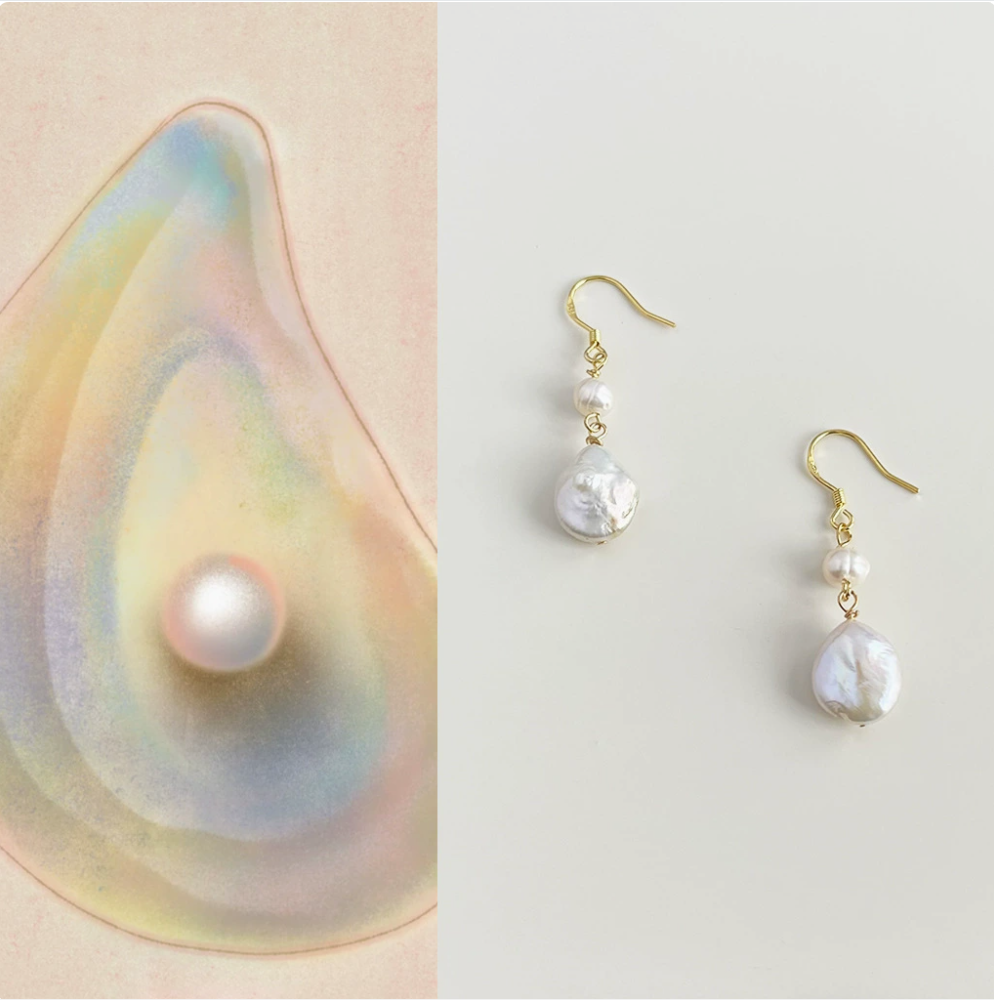 Pearl earring set with a pearl inside a shell on a light background