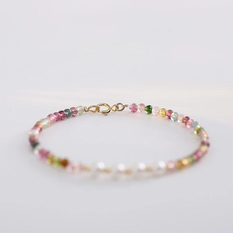 Multicolored beaded bracelet on a white background