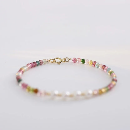 Multicolored beaded bracelet on a white background