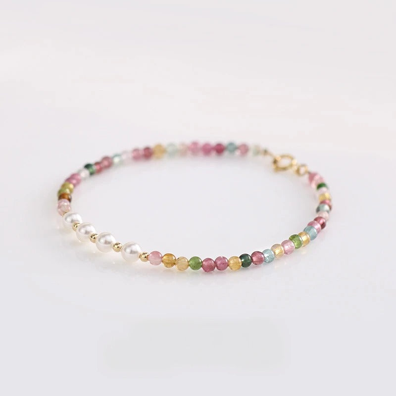 Multicolored beaded bracelet on a white background