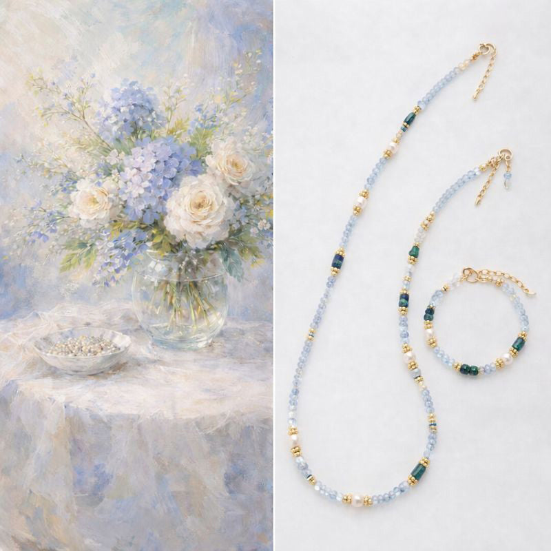 Beaded necklace and bracelet set with a still life painting of flowers and jewelry.