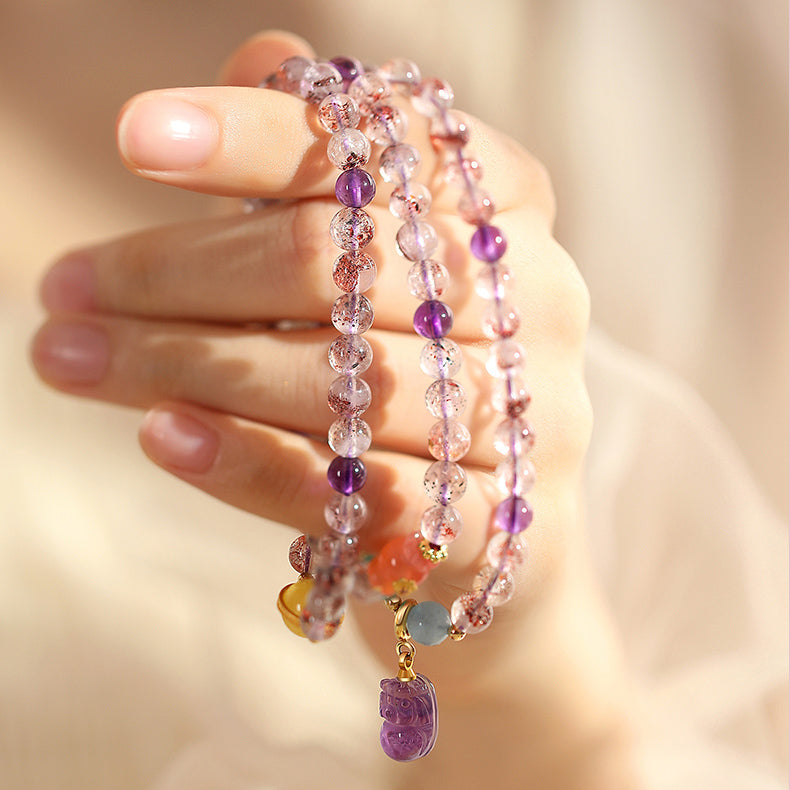Multicolor Super Seven Crystal Amulet Bracelet with Carved Amethyst Charm