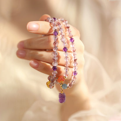 Multicolor Super Seven Crystal Amulet Bracelet with Carved Amethyst Charm