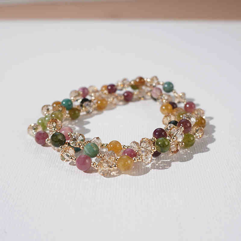Multicolored beaded bracelet on a white background